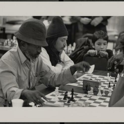 Tenderloin Chess Masters playing at a tournament