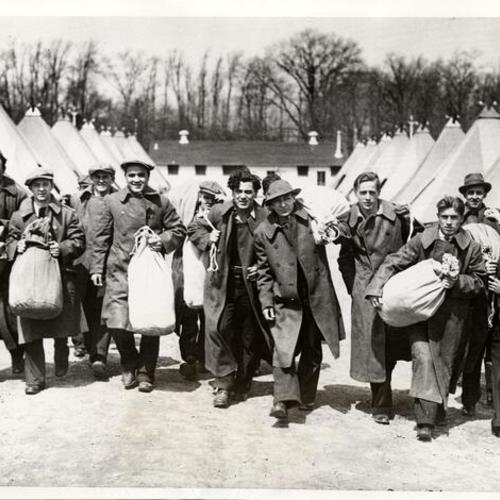 [Group of unemployed workers arriving to work in President Roosevelt's Forest Conservation Corps]