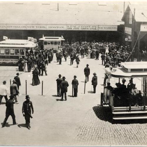 [Crowd of people in front of the Ferry Building]