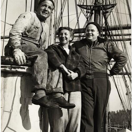 [Jack and Rose Kissinger with San Francisco News shipping reporter Richard MacFarlane on the sailing ship "Pacific Queen" (also known as the "Balclutha")]