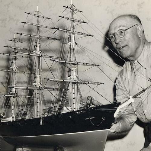 [Captain Charles Van Remoortel and the ship model of "Flying Cloud"]