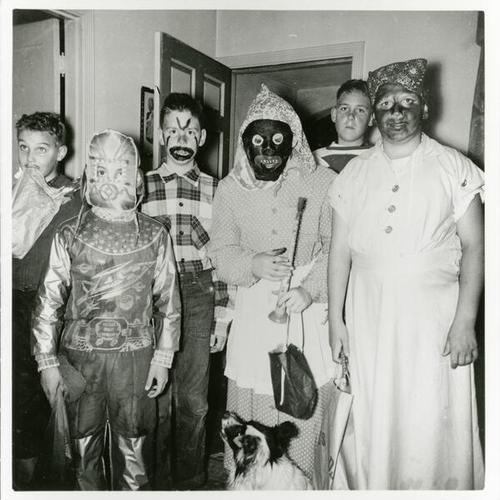 [Friends dressed up on Halloween in 1954]