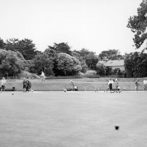 [People bowling at the bowling green in Golden Gate Park]