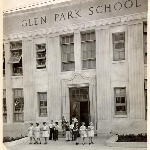 [Group of students standing in front of Glen Park School]