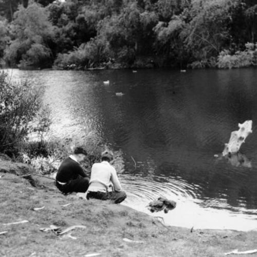 [Two unidentified boys at North Lake in Golden Gate Park]
