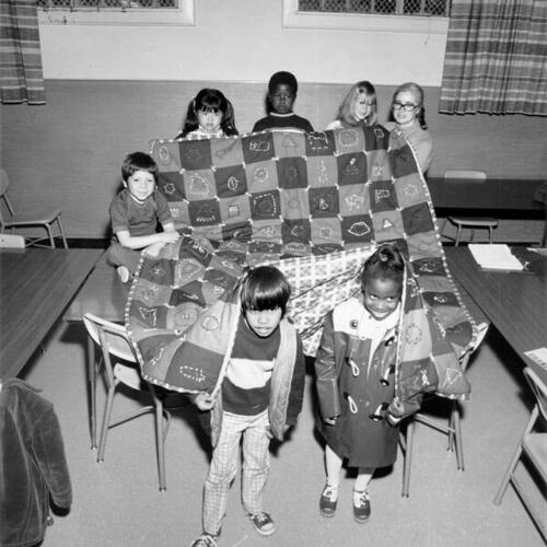 [John Swett School students and teacher with a Bicentennial Quilt]