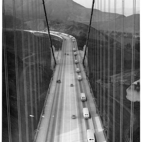 [Line of Greyhound buses crossing the Golden Gate Bridge on their way to Marin County]