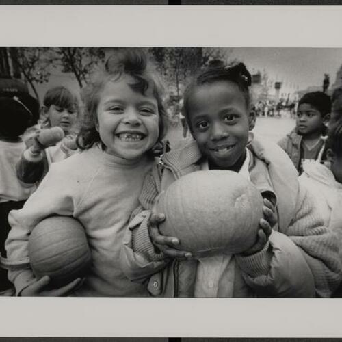 Tenderloin children with pumpkins at Harvest Festival in October 1988