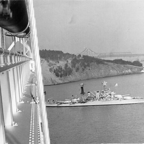 [Battleship U.S.S. Pennsylvania sails under Bay Bridge enroute the bridge dedication ceremony]
