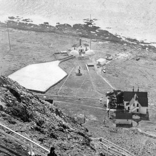 [Jim Bentler of Seattle, former Coast Guardsman, walking down path from the lighthouse atop Southeast Farallon Island]