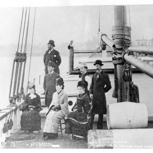 [Writer Robert Louis Stevenson and a group of people on the yacht Casco in Oakland Harbor]