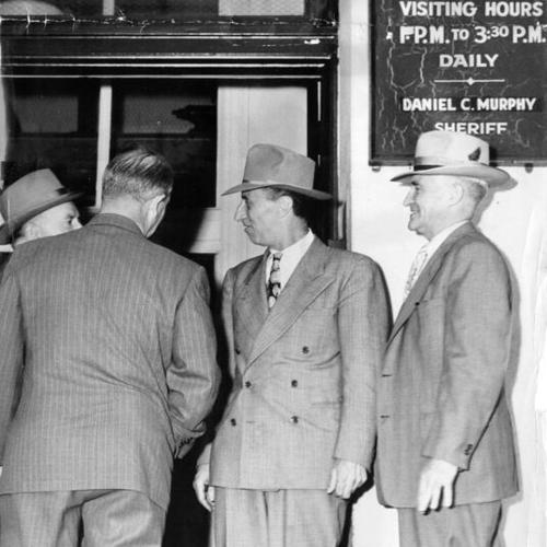 [Longshore leader Harry Bridges entering the County Jail No. 1 at the Hall of Justice]