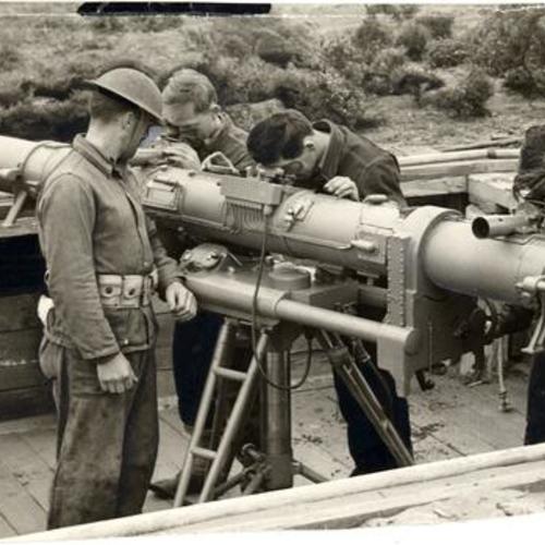 [Soldiers operating a range finder at Fort Miley]