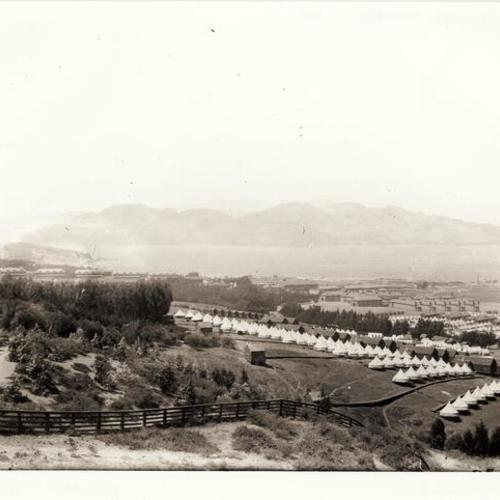 [View of the Presidio, army barracks and tents, and San Francisco Bay in background]
