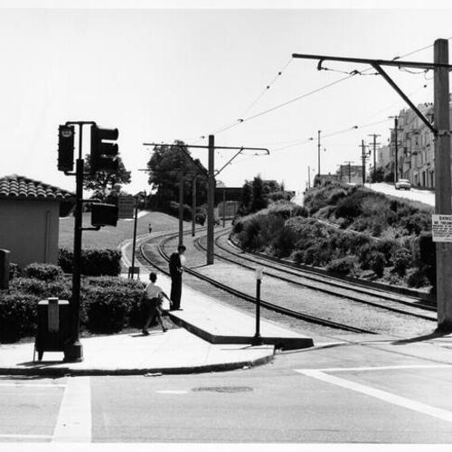 [Municipal Railway J line streetcar entrance through Dolores Park at Church and 18th streets]