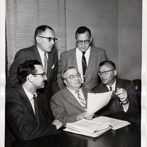 [Hyman Kaplan and others at press conference at Jewish Welfare Federation]
