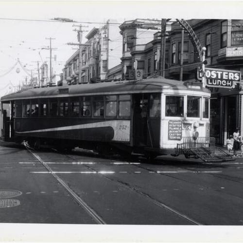 [Fillmore and Sutter streets looking north at inbound #3 line car 252 turning onto Sutter in front of Fosters Lunch]