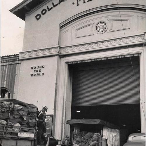 [Sacks of mail being unloaded at Pier 42]