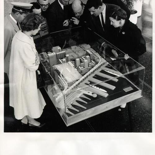 [Tenants of the new Bethlehem Building looking at a model of a proposal]