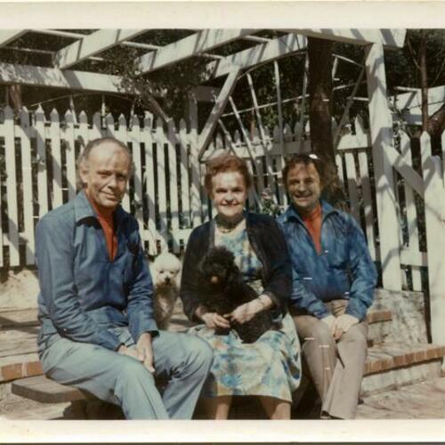 [Harry Hay, John's mother with dog on her lap, and John Burnside]