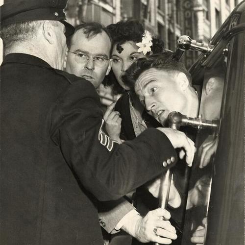 [Striking telephone operators being arrested by police during a demonstration]