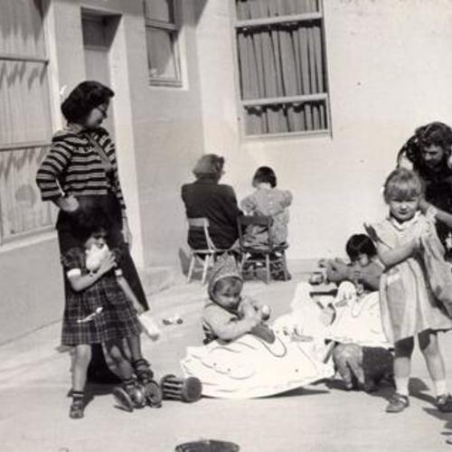 [Children and attendants at a nursery in the Youth Guidance Center]