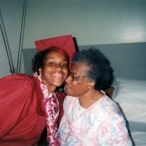 [Jonique with grandmother after high school graduation]