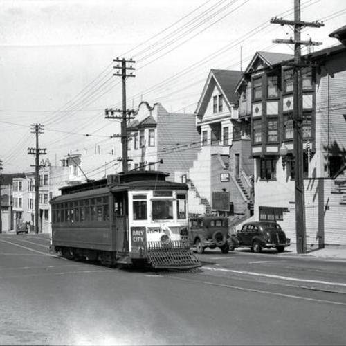 [Mission and Randall streets looking north at outbound #14 line car 1581]