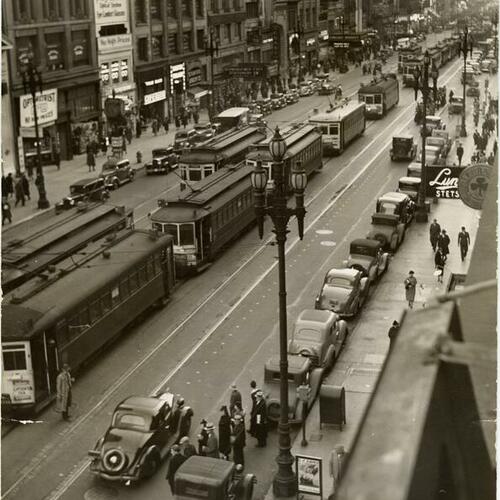 [Streetcars lined up down Market Street]