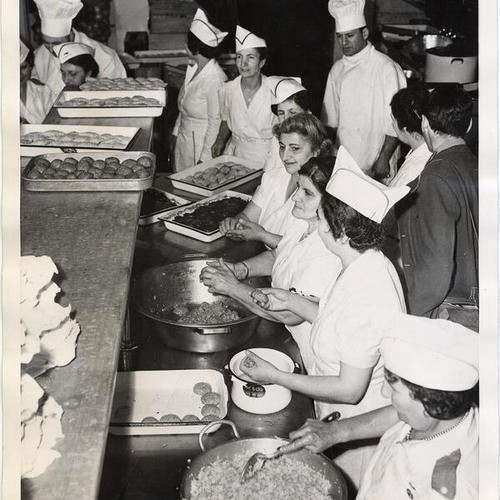 [Cooks in kitchen at Veterans Memorial Building preparing food for United Nations conference]