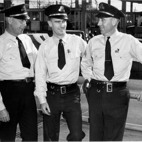[Highway patrol Sergeants Harry Seymour, Charles Mannix and Pernal Anderson at Toll Booths]