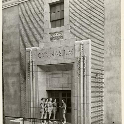 [Group of girls standing outside of the Polytechnic High School Girls' Gym]