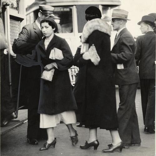 [Passengers boarding a streetcar during general strike]