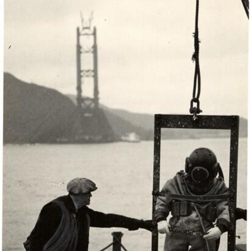 [Golden Gate Bridge construction diver prepares to descend]