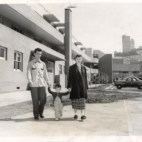 [Theodore and Mary Martin with their son, Teddy, at the North Beach Place housing project]