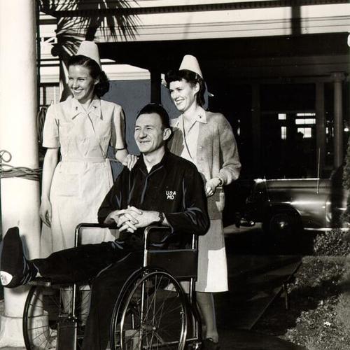 [Army nurses Faye Hirschy and Jacquie Lane with patient Edward F. Meier at Letterman General Hospital]