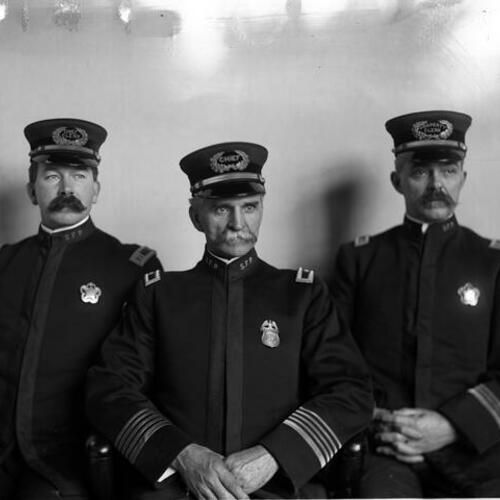 [San Francisco Police Department, Police Chief Jesse Cook with two clerks]