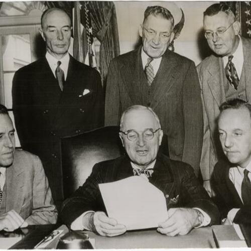 President Truman (center) seated at first meeting with Citizens Food Committee at White House