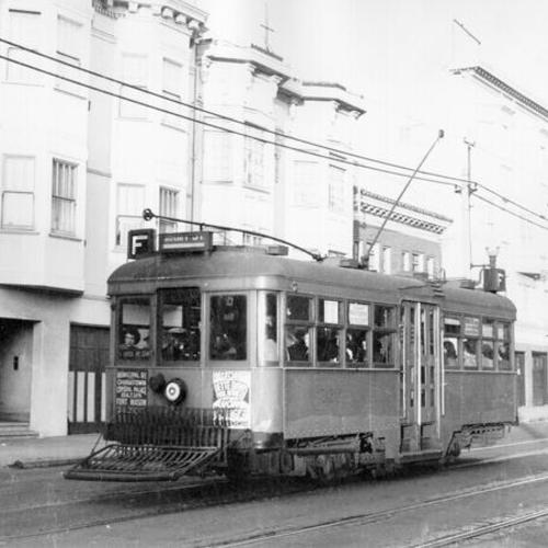 [Municipal Railway F line streetcar traveling west on Chestnut Street]