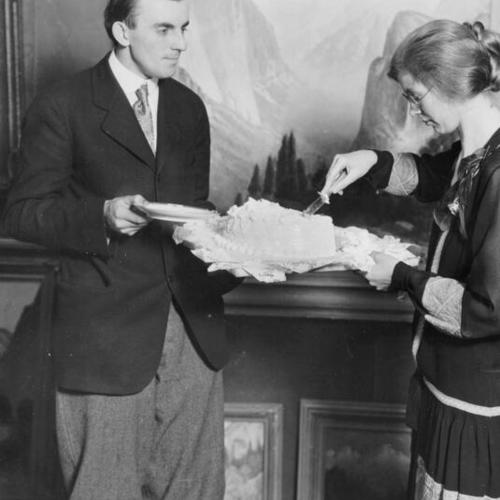 [Ansel Adams cuts wedding cake with Virginia Best]