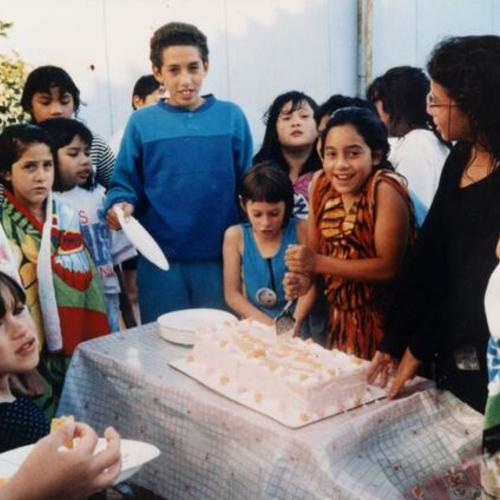 [Portrait of a birthday party with children and cake on Silver Avenue]