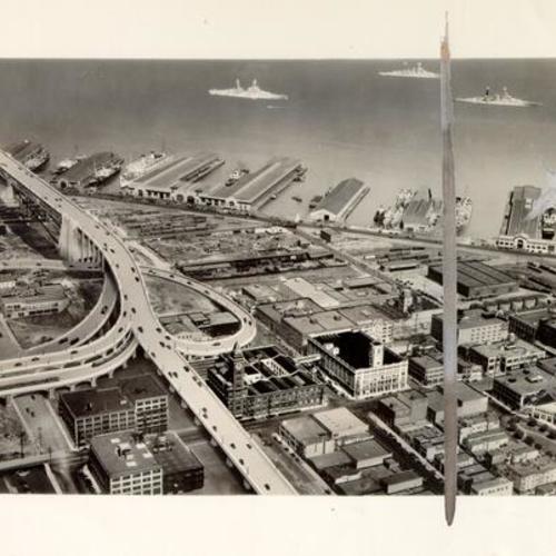 [Aerial view of the South of Market district with artist's rendering of planned approach to the San Francisco-Oakland Bay Bridge]