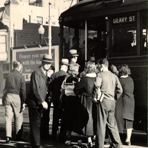 [Passengers boarding a streetcar on Geary Street]