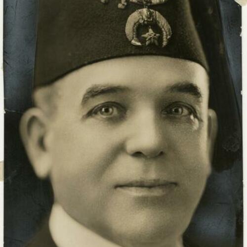 William L. Hughson in Shriner's hat