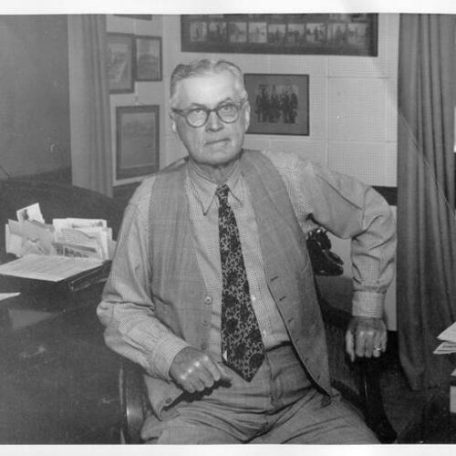 [Unidentified man in an office in Visitacion Valley]