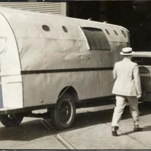 [Armored trailer used to transport strikebreakers to dock during longshoremen's strike]
