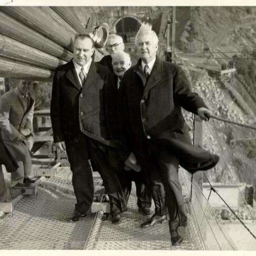 [Group of officials viewing construction of the San Francisco-Oakland Bay Bridge]