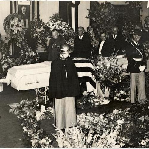[Bodies of Howard Sperry and Nickolas Bordoise, strike riot victims, lying in state at I. L. A. headquarters before funeral services]