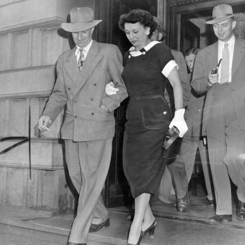 [Harry Bridges and his wife Nancy leave the Federal Building after his release from jail]