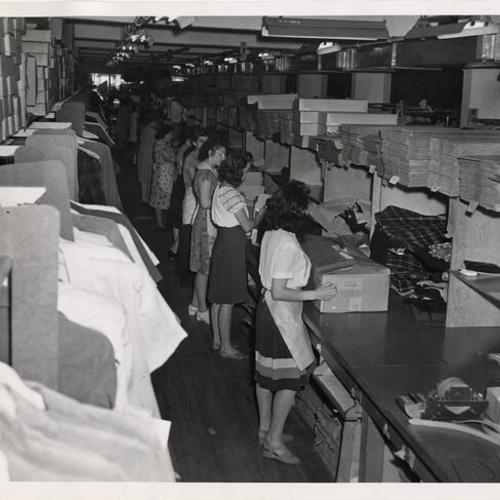[Interior of the packing and shipping department of Koret of California located in Apparel City]